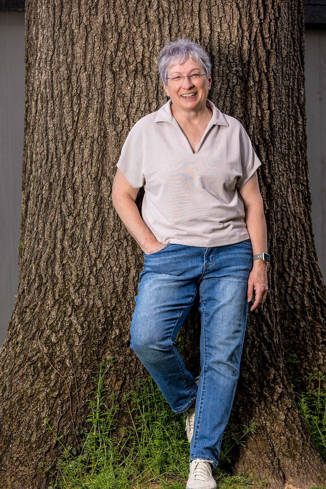 Amy Gracey Nash, author of The Runaway, smiling outdoors